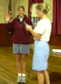 Cdr. Kim inducts Becky into NHPS.