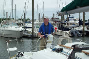 Gil Simmons at the Helm using a horn to notify WTNH viewers that NHPS leads the way in boating safety,